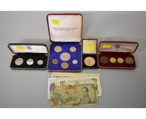 Coins: a Sierra Leone 'First National Currency Independence 1961' six coin set; together with a Jersey 1964 four coin set; a 