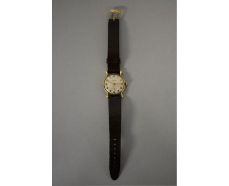 A circa 1949 Benson 9ct gold manual wind wristwatch, 29mm, on replacement leather strap. 