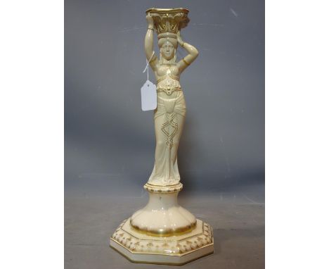An early 20th century Sarreguemines pottery figural candlestick, H.44cm 