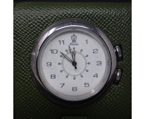 An Italian Pineider leather travel alarm clock, in box with dust bag, 8.5 x 7cm 