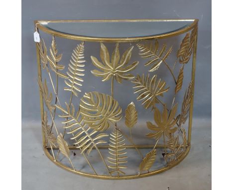 A contemporary gilt metal demi lume console table, with leaf design and bevelled mirrored top, H.77 W.86 D.35cm 