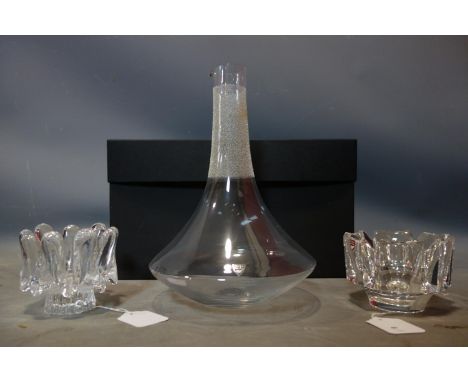 Swedish Orrefors decanter with original box and two Swedish glass tea light/candle holders, one Orrefors. 