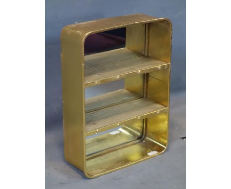 A contemporary gilt metal wall hanging book shelf, H.68 W.50 D.18cm 