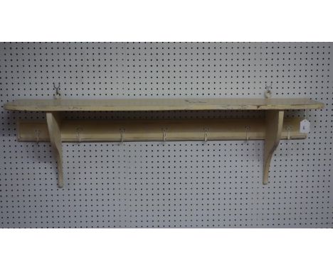 A vintage painted wall hanging coat and hat stand with shelf, H.40 W.130 D.27cm 