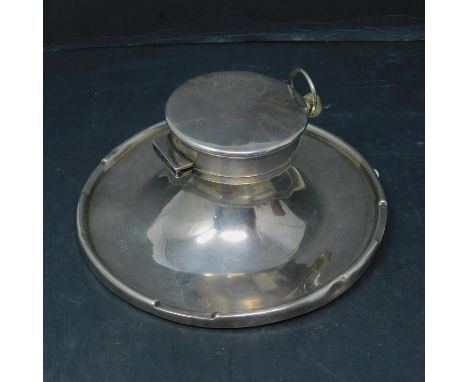 A silver capstan inkwell with glass liner, Birmingham 1923, having silver plated Golden Crown Lever pocket watch to interior 