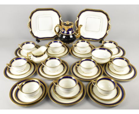 An Aynsley Cobalt Blue and Gilt Trim Tea Set to Comprise Elven Cups, Twelve Saucers, Eleven Side Plates, Two Cake Plates, Mil