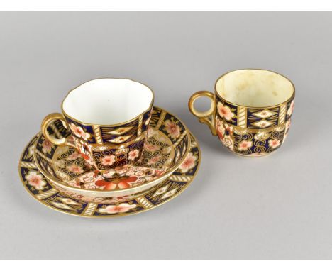Four Pieces of Royal Crown Derby Old Imari 2451 Pattern, Two Cups, Saucer and Side Plate