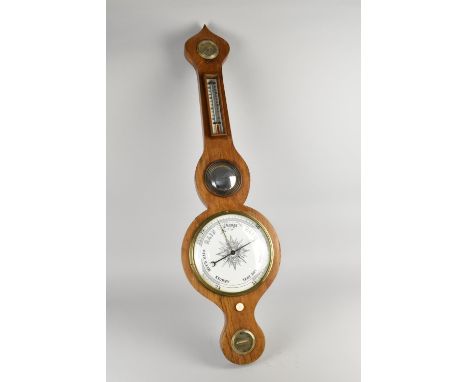 An Onion Top Four Dial Wheel Barometer