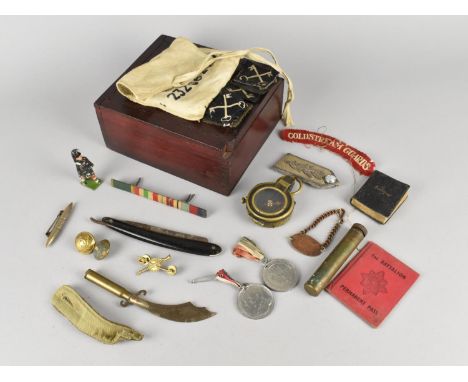 A Vintage Wooden Box with Sliding Lid Containing Military Cloth Badges, "Capenhurst" Trench Art Spent Bullet Letter Opener, W