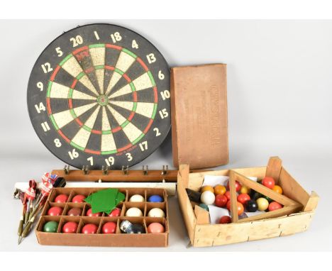 A Collection of Snooker Balls Together with a Dartboard and Darts