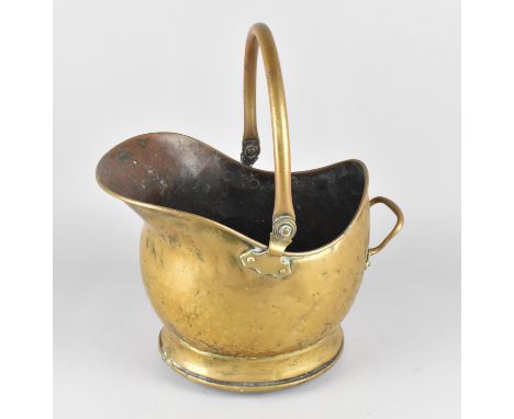 A Mid 20th Century Hammered Brass Helmet Shaped Coal Scuttle, Base Plate Somewhat Distorted