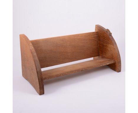 Robert 'Mouseman' Thompson of Kilburn, an oak book trough, carved signature mouse, width 45.5cm, depth 21cm, height 20.5cm.