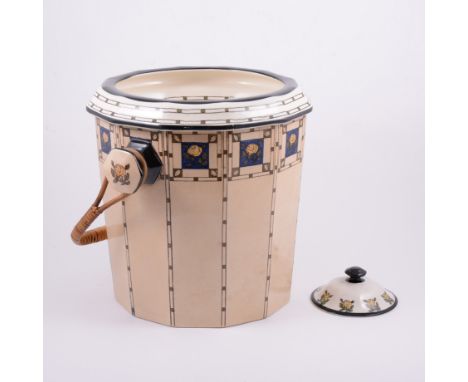 Doulton Burslem, an Art Nouveau toilet basin, circa 1910, of faceted form with twin handles and original rattan handle, with 