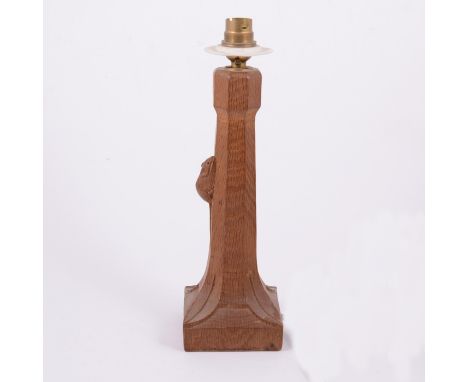 Robert 'Mouseman' Thompson of Kilburn, an oak table lamp, octagonal column with flared square section base, carved signature 