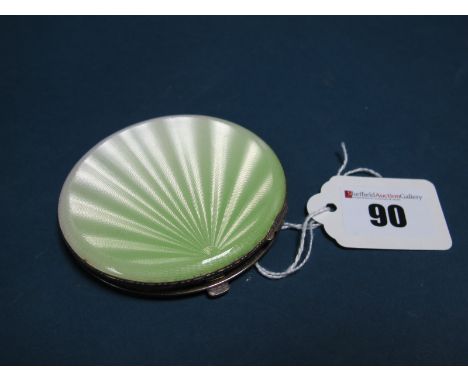 A Hallmarked Silver and Enamel Powder Compact, Crisford &amp; Norris, Birmingham 1947, of circular form, highlighted in lime 