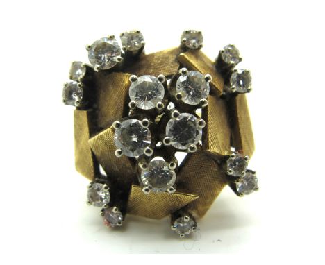 A Vintage Diamond Set Cocktail Dress Ring, of abstract textured design, claw set throughout with brilliant cut diamonds, stam