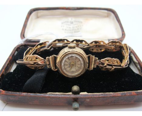 Perfex; A Vintage 9ct Gold Cased Ladies Wristwatch, the signed dial with Arabic numerals and line markers within plain case, 