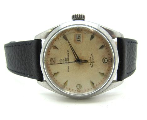 Tudor; A Vintage Automatic Gent's Wristwatch, the signed dial with Arabic numerals, dagger markers, centre seconds and date a