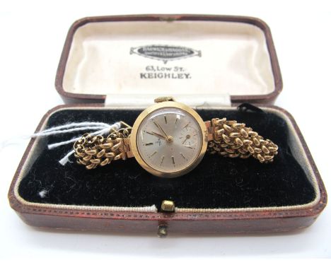 Tudor; A Vintage Scottish Hallmarked 9ct Gold Cased Ladies Wristwatch, the signed dial with line markers and seconds subsidia