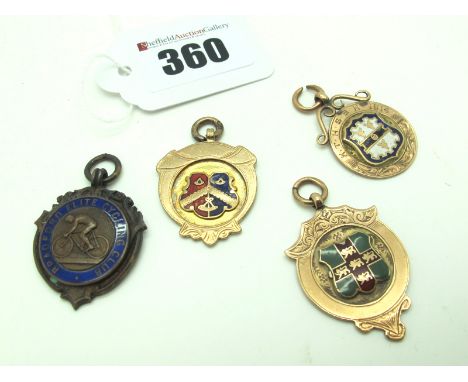 Three 9ct Gold Medallion Pendants, each highlighted in enamel, one engraved "K.T.H.S.B.H. 1914"; together with a "Bradford El