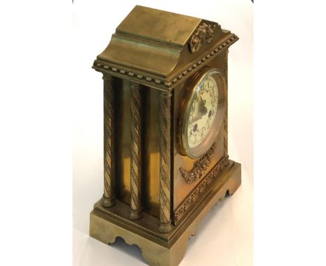 Antique brass mantle clock, measures approx 27cm tall by 18cm wide 