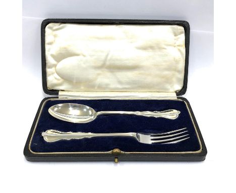 Silver spoon and fork set in box mint condition London 1923 weight 63g 