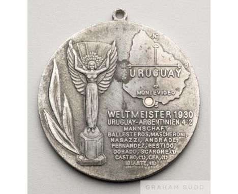 Uruguay 1930 World Cup commemorative medal re-issued in 1978 during the Argentina World Cup,
large, diameter 8cm., white meta