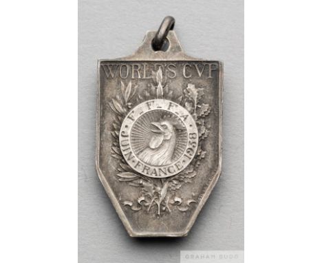 1938 France FIFA World Cup silver runners-up medal,
made by Abel LaFleur (the creator of the Jules Rimet Trophy), obverse wit