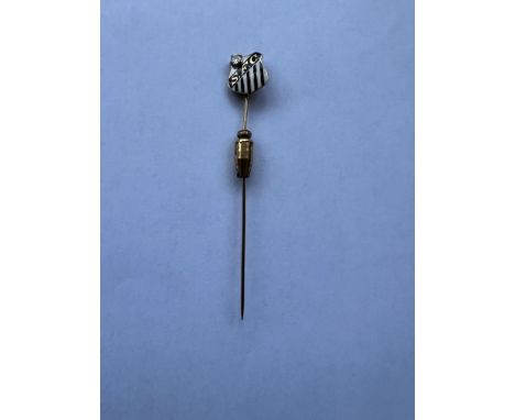 Ex-Pelé Collection:&nbsp;Pelé’s gold and diamond Santos FC stick pin, 
18k yellow gold, the pin topped with a black &amp; whi