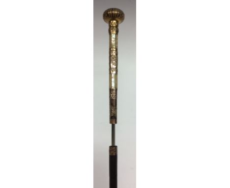 A late 19th century gentleman's yellow metal, mother of pearl and ebonised bamboo sword stick, chased and inlaid, 90.5cm long
