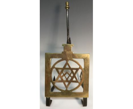 An early 19th century iron and brass Masonic trivet, square plateau with square and compass inscribed Strength, Concord, Peac