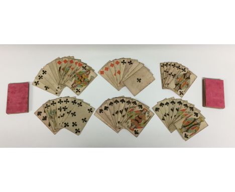 Two packs of 19th century playing cards, the backs plain and pink, 8.5cm long