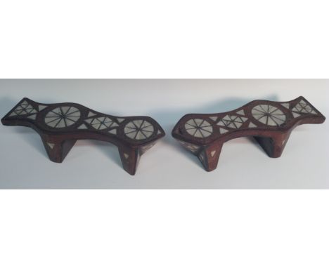 A pair of Turkish hardwood stilted bath house shoes, inlaid in the Moorish taste with mother of pearl and silvered stringing,