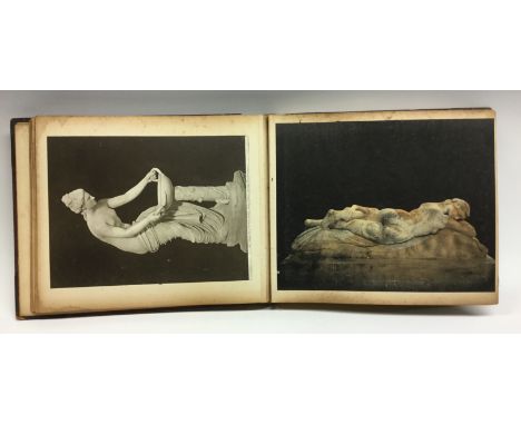 An interesting 19th century Grand Tour album, containing pasted pictures of ancient and Renaissance sculpture and paintings a