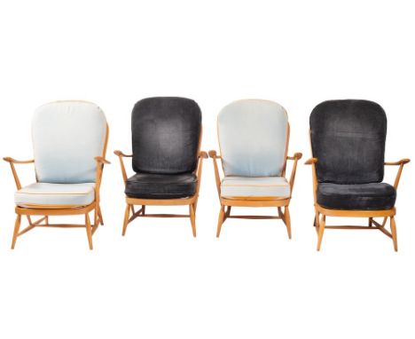 A set of four blonde beech armchairs, by Ercol, circa 1960s; each with hoop back and spindle supports with shaped arms; 87cm 