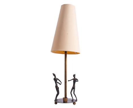 A brass and painted metal figural table lamp, third quarter 20th century; the conical shade and electrical fitment on a shaft