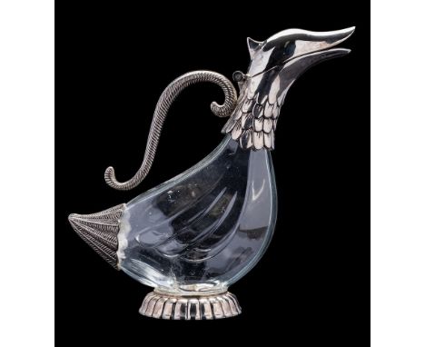 A clear glass and white metal mounted anthropomorphic decanter, in the form of a bird, 26cm high.