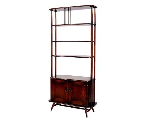 A dark elm 'Giraffe' room divider, by Ercol, circa 1960s; the upper gallery above height-adjustable shelves; the base section