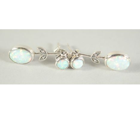 A PAIR OF SILVER AND OPAL LONG DROP EARRINGS.