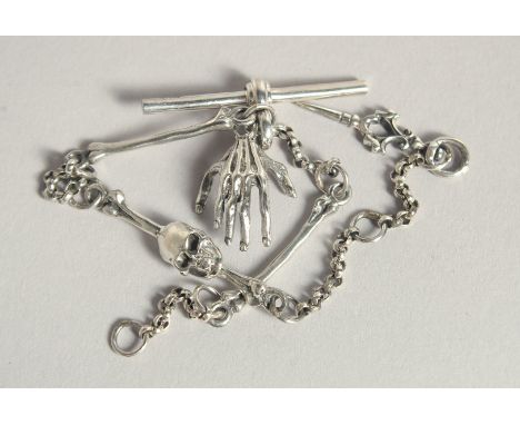 A SILVER SKULL WATCH CHAIN.