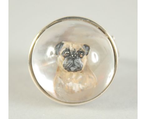 A SILVER ESSEX STYLE CRYSTAL PUG DOG RING.