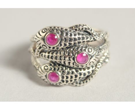 A SILVER RUBY SET THREE RING.