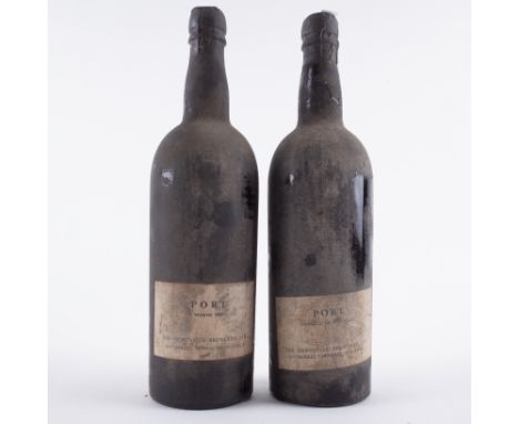 TWO BOTTLES VINTAGE PORT BOTTLED BY THE NEWCASTLE BREWERIES LTD.Labelled Warne, believed to be Warre 1955; and Warre 1955From