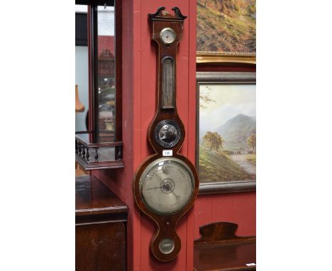 A George III mahogany banjo barometer, by William & Haydons of London, wavy broken pediment, silvered thermometer and registe