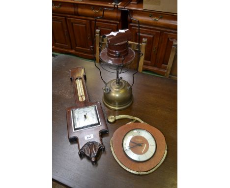 A retro 1960s wall hanging Kienzle automatic clock, later quartz movement;  a carved Mahogany framed barometer/thermometer;  