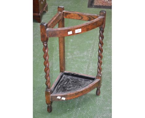 An oak corner stick stand, barley twist uprights