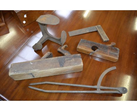 Tools - a 20th century wood plane; another; a shoe last; etc.