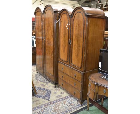 A four piece double domed top bedroom suite by Maple quality, comprising a double wardrobe, gentleman's wardrobe with three d