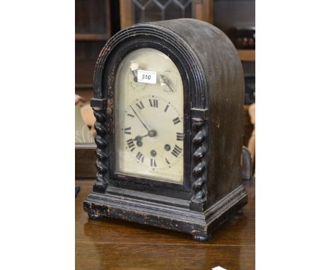 A late 19th Century German ebonised, domed mantle clock, chime, silent, 3 winding holes, barley twist pilaster supports
