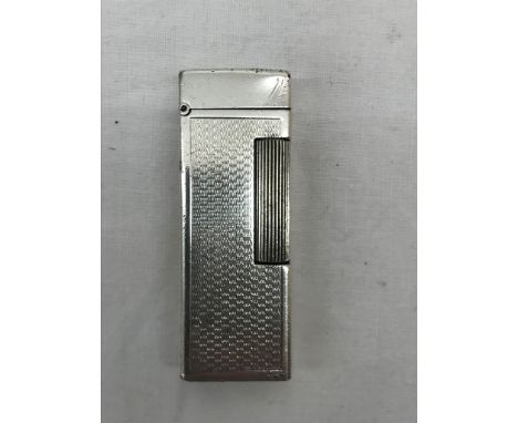 A Dunhill silver-plated wick oil lighter